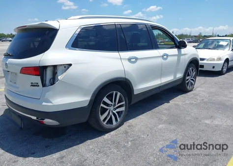 2018 Honda Pilot Elite z USA, uszkodzony, nr VIN 5FNYF6H00JB058623